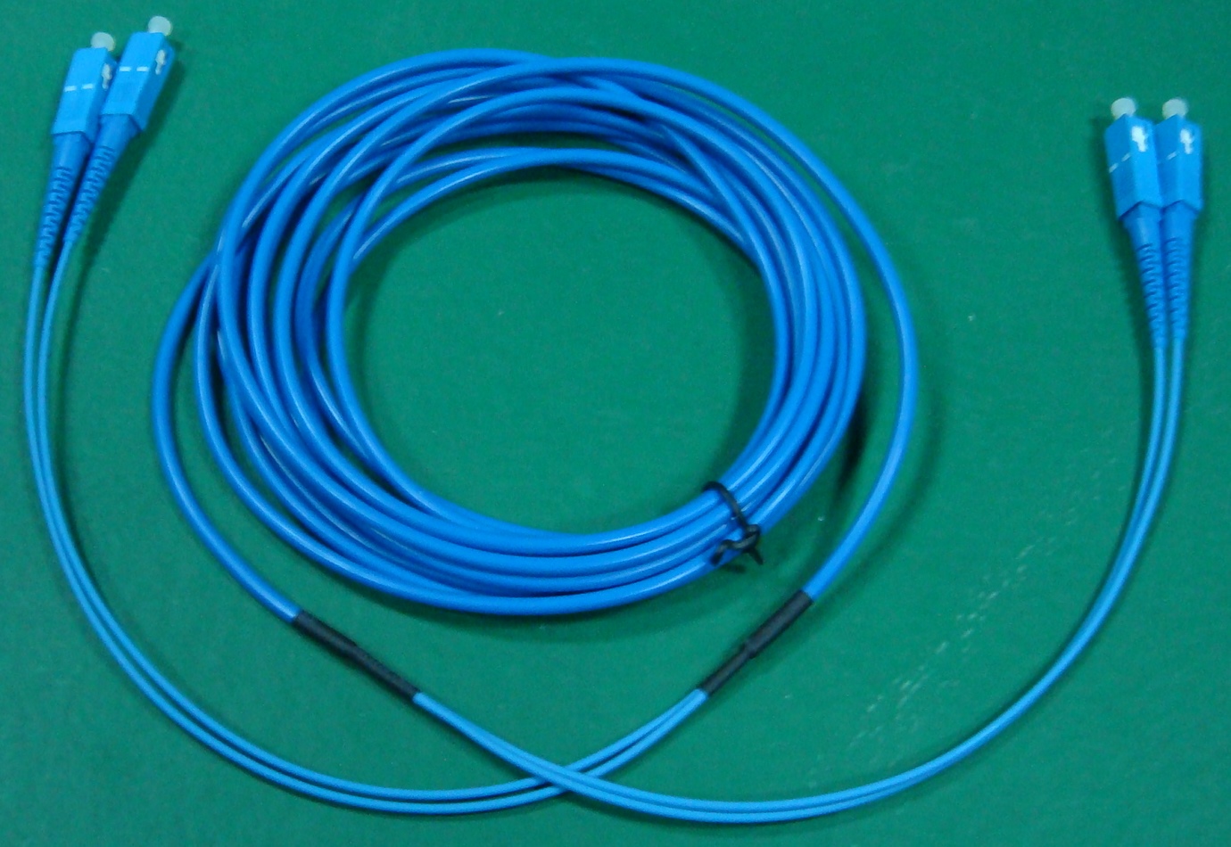 FO patch cord duplex armovaný 50/125 SC-SC 110m, OS2